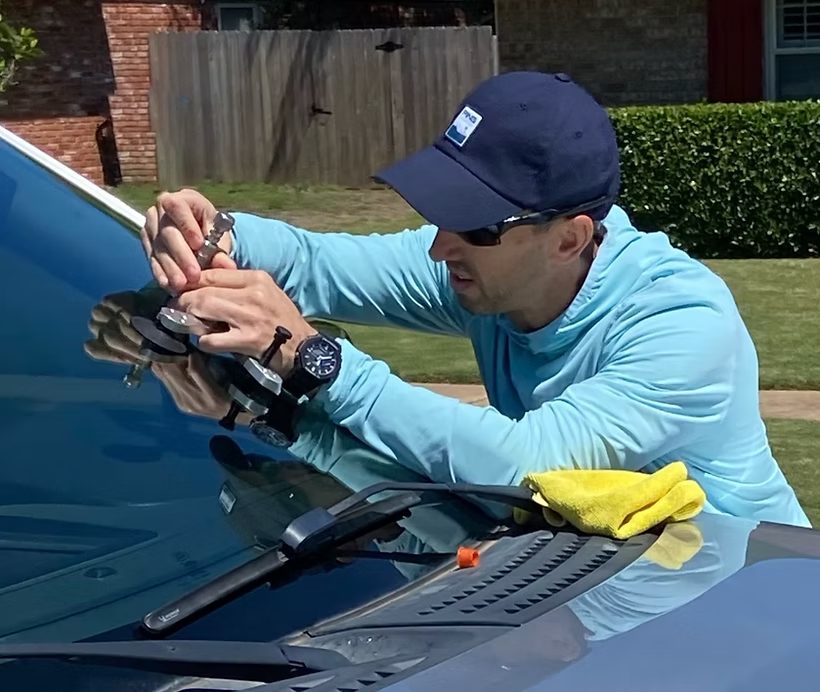 Brandon performing professional windshield repair in Edmond, Oklahoma